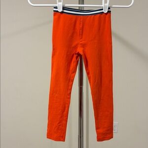 Gymboree Girls’ Vibrant Orange Leggings with Navy Striped Waistband
